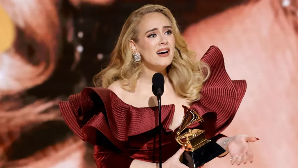 Adele Wins At The Grammys & Accepts Award From “Best Friend” Dwayne Johnson